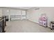 Expansive bonus room area with soft carpeting, neutral walls, and ample space for flexible living and entertainment at 6472 W Treeline Ln, McCordsville, IN 46055