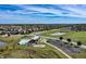 Overhead view featuring a community pool, playground, basketball court, and surrounding residential area at 6472 W Treeline Ln, McCordsville, IN 46055