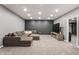 Cozy living room boasts plush carpeting, and recessed lighting for an inviting feel at 6472 W Treeline Ln, McCordsville, IN 46055