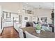 Open living space featuring the living room, kitchen, and dining area at 6472 W Treeline Ln, McCordsville, IN 46055