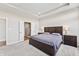 Well-lit main bedroom featuring a king bed, bedside tables, and en-suite bathroom at 6472 W Treeline Ln, McCordsville, IN 46055