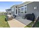 Concrete patio featuring outdoor seating and furniture at 6472 W Treeline Ln, McCordsville, IN 46055