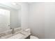 Bathroom features granite countertop and a modern sink and fixtures at 718 Marie Ln, Fortville, IN 46040