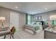 This is a charming bedroom with a cozy atmosphere, featuring green accents and ample natural light at 7337 Deerberg Dr, Indianapolis, IN 46259