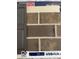 Selection of brick, siding, and door colors in a sample board at 7337 Deerberg Dr, Indianapolis, IN 46259
