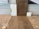 Sample of flooring, cabinet color, and trim choices at 7337 Deerberg Dr, Indianapolis, IN 46259