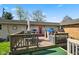 Inviting back deck with outdoor seating, grill, and playhouse, ideal for Gathering gatherings and relaxation at 7482 N Maple Dr, Frankton, IN 46044