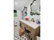 This bathroom features a wood vanity, white countertop, and decorative mirrors above at 7482 N Maple Dr, Frankton, IN 46044