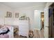 Charming bedroom features a twin bed, white dresser, and hardwood floors at 7482 N Maple Dr, Frankton, IN 46044