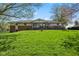 Well maintained single Gathering home with brick accents and a lush green lawn at 7482 N Maple Dr, Frankton, IN 46044