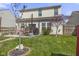 Spacious backyard featuring a patio, outdoor seating, and well-manicured lawn at 8158 Wheatfield Ct, Camby, IN 46113