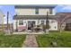 Inviting backyard with patio area, outdoor seating, and a beautifully landscaped lawn at 8158 Wheatfield Ct, Camby, IN 46113
