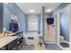Bright bathroom featuring a soaking tub, walk-in shower, and modern fixtures at 8158 Wheatfield Ct, Camby, IN 46113