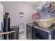 Laundry room with modern washer and dryer, shelving, and storage solutions at 8158 Wheatfield Ct, Camby, IN 46113