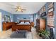 Charming main bedroom with a large bed, wooden furniture set, and ample natural light at 8158 Wheatfield Ct, Camby, IN 46113