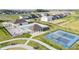 Aerial view of community amenities featuring a pool, pickleball court, covered shelters and residences at 827 Allandale Ave, Westfield, IN 46074