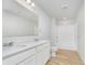 A bright bathroom with double sinks, a shower-tub combo, and wood-look flooring at 827 Allandale Ave, Westfield, IN 46074