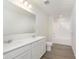 Modern bathroom with double vanity, a large mirror, and a combined shower and bathtub at 827 Allandale Ave, Westfield, IN 46074