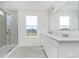 Bathroom featuring a glass shower, double sink, and tiled floor at 827 Allandale Ave, Westfield, IN 46074