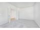 Spacious bedroom featuring neutral carpet and trim with two entry doors at 827 Allandale Ave, Westfield, IN 46074