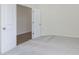 Cozy bedroom features a neutral carpet and an open doorway that leads to another room at 827 Allandale Ave, Westfield, IN 46074