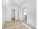 Bright bedroom with vinyl floors and open closet and kitchen views at 827 Allandale Ave, Westfield, IN 46074