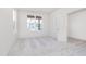 Serene bedroom with neutral carpet, a large window, and a simple, elegant design at 827 Allandale Ave, Westfield, IN 46074