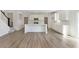 Open-concept kitchen with stainless steel appliances, white cabinets, and a large kitchen island at 827 Allandale Ave, Westfield, IN 46074