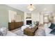Relaxing living room with a modern fireplace, comfortable seating, and stylish decor at 827 Allandale Ave, Westfield, IN 46074