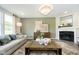 Bright and airy living room with fireplace, stylish decor, and comfortable seating at 827 Allandale Ave, Westfield, IN 46074