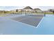 Outdoor pickleball court with a blue and gray surface, nets and a gazebo in the background at 827 Allandale Ave, Westfield, IN 46074