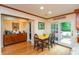 Breakfast nook with sliding glass doors leading to the backyard pool at 8535 Washington Blvd, Indianapolis, IN 46240