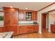 Spacious kitchen with custom wood cabinetry, granite countertops and stainless appliances at 8535 Washington Blvd, Indianapolis, IN 46240