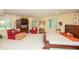 Large main bedroom suite with plenty of natural light and a cozy sitting area at 8535 Washington Blvd, Indianapolis, IN 46240