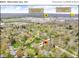 Aerial view of home's proximity to North Central High School and Nora Shopping Area at 8621 Manderley Dr, Indianapolis, IN 46240