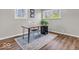 Office space with laminate flooring, natural light, and neutral decor, a serene work environment at 8621 Manderley Dr, Indianapolis, IN 46240