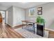 Office space with laminate flooring, natural light, and neutral decor, a serene work environment at 8621 Manderley Dr, Indianapolis, IN 46240