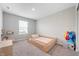 Bedroom featuring a bed, window, carpet, and wallpaper at 8694 Moyer Pl, Pendleton, IN 46064