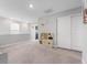 Cozy loft area with natural light and carpet at 8694 Moyer Pl, Pendleton, IN 46064