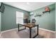 Office space featuring a desk, chair, and shelving units at 8694 Moyer Pl, Pendleton, IN 46064