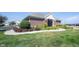 Beautiful shot of the community clubhouse and green space at 9770 Blue Violet Dr, Noblesville, IN 46060