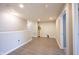 Hallway area with neutral walls, hardwood floors, and plenty of light at 9770 Blue Violet Dr, Noblesville, IN 46060