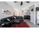 Inviting living room with a plush sectional sofa and neutral decor at 9770 Blue Violet Dr, Noblesville, IN 46060