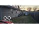Home exterior showing back yard and detached garage at 1006 Columbia Ave, Alexandria, IN 46001
