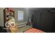 Bedroom with grey walls, carpeting and small window at 1006 Columbia Ave, Alexandria, IN 46001