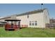 Beautiful backyard with a wooden gazebo and ample green space at 10597 Cyrus Dr, Indianapolis, IN 46231