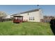 Large backyard with a wooden gazebo, ideal for outdoor activities at 10597 Cyrus Dr, Indianapolis, IN 46231