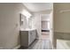 Modern bathroom features double sink vanity and seamless design, providing ample space at 10597 Cyrus Dr, Indianapolis, IN 46231