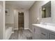 Clean, modern bathroom showcasing vanity with a tub for a luxurious feel at 10597 Cyrus Dr, Indianapolis, IN 46231