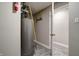 Efficient utility room featuring a water heater and access to other areas of the home at 10597 Cyrus Dr, Indianapolis, IN 46231